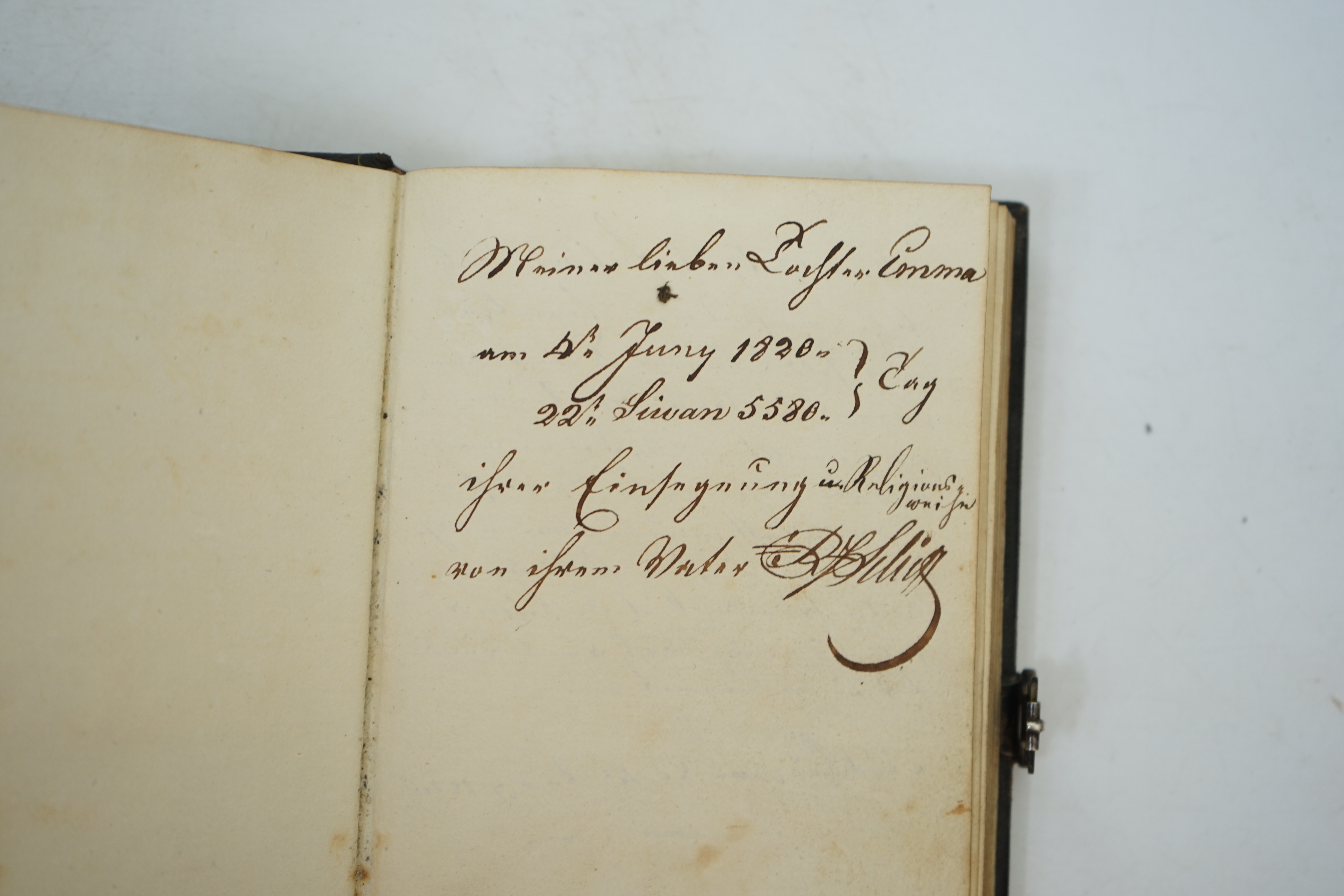 An early 19th German book of Songs and Singing, for domestic and public use, for Israelites - ‘’Religidse Lieder und Gefange’’, 8vo, grained black morocco, the corners of the boards mounted with silver acorns and oak lea